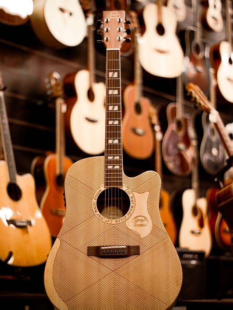 A wall of acoustic guitars